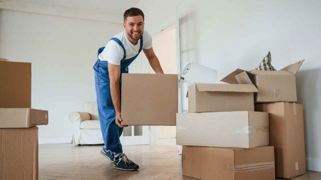 Affordable home moving services in Dubai loading furniture and boxes safely