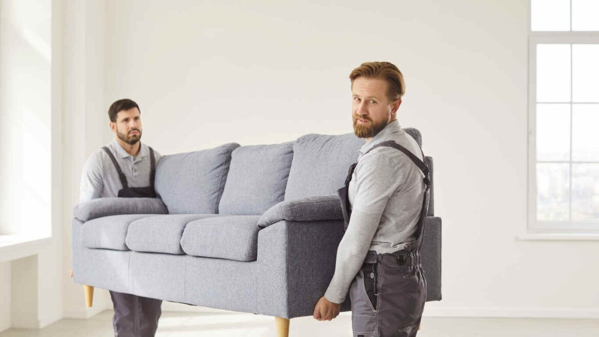 Professional office packers and movers loading office furniture